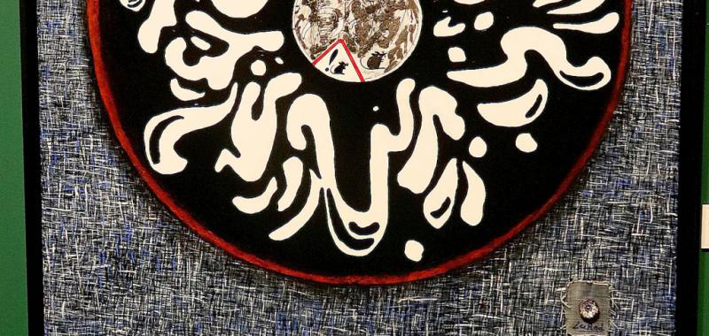 Un elefante y un ratón dentro de un botón